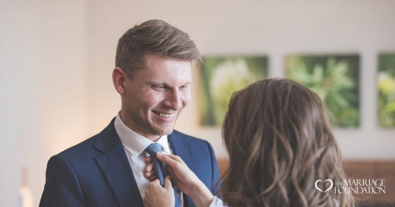 wife-fixing-the-neck-tie-of-husband